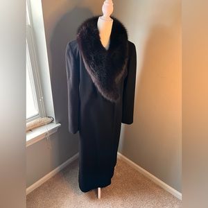 Wool coat with faux fur collar.